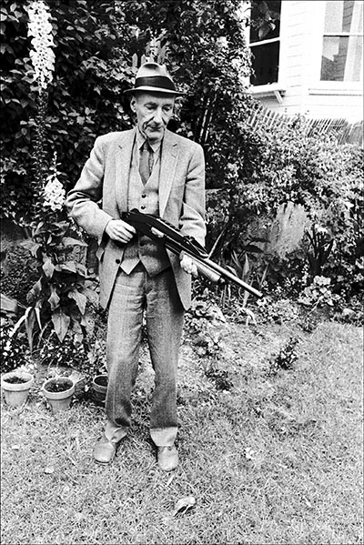 Burroughs in Garden with Shotgun, 1981, photograph by Ruby Ray Burroughs in Garden with Shotgun, 1981, photograph by Ruby Ray